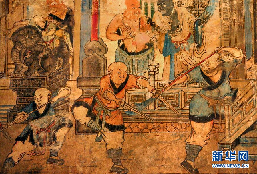 少林寺白衣殿內(nèi)的墻上表現(xiàn)少林武僧習(xí)武練拳的壁畫(局部,2005年9月15日攝)。