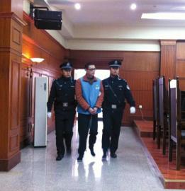 趙勇被帶上法庭。