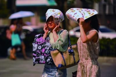 進(jìn)入7月份以來，南京出現(xiàn)了多個高溫天氣。本報資料圖片 劉瀏 攝