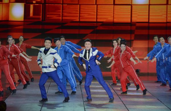 《小蘋果》、《最炫民族風》等廣場舞曲將會有全國統(tǒng)一、編排科學、帶給人正能量的全新動作。 CFP 資料